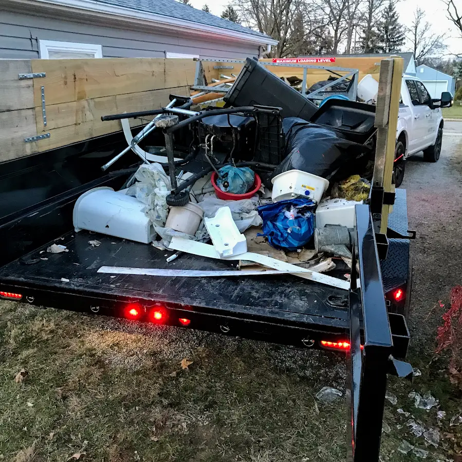 Roll-off dumpster delivered to a residential driveway in Boca Raton