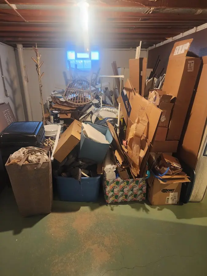 Roll-off dumpster container at job site for 8 Yard Dumpster Rental in Boca Raton